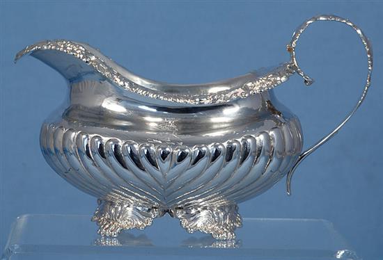 A George III demi fluted silver cream jug, by Joseph Angell I, Length 160mm Weight 7.2oz/225grms